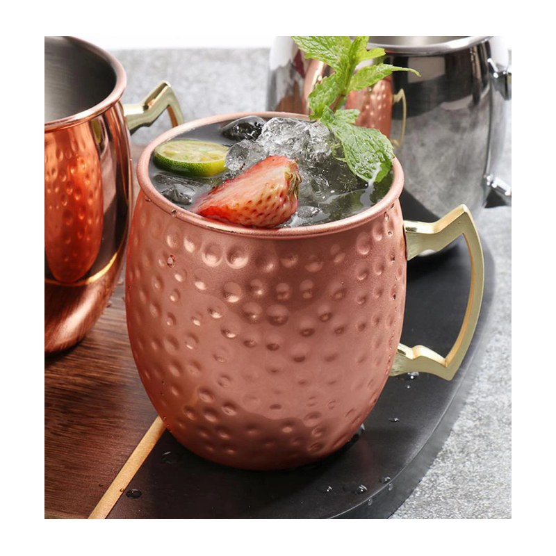 Jarra de acero inoxidable para mojitos en cobre martillado y asa dorada
