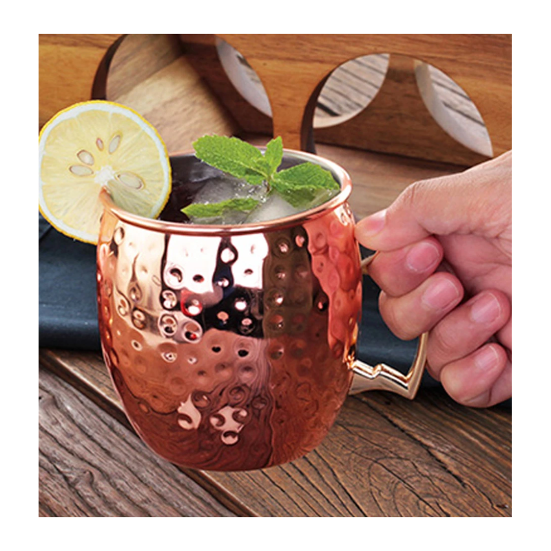 Jarra de acero inoxidable para mojitos en cobre martillado y asa dorada