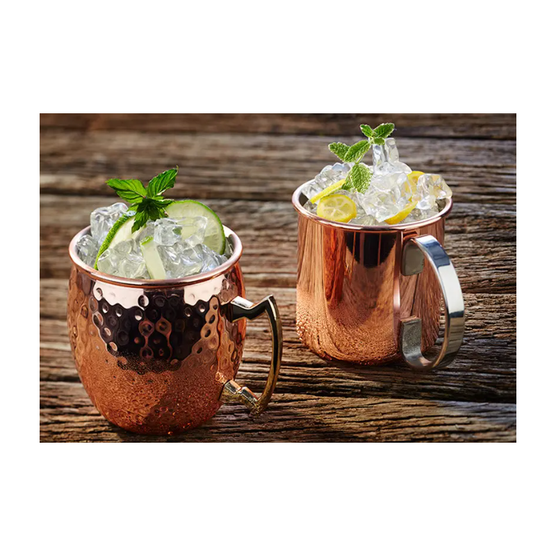 Jarra de acero inoxidable para mojitos en cobre martillado y asa dorada